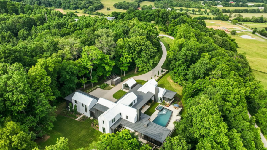80 Acre Estate With Modern Farmhouse And Showroom Garage