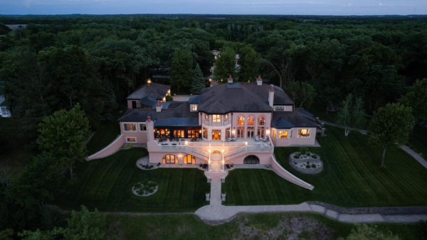 Lakefront Estate In Minnesota With 20-Car Showroom Garage