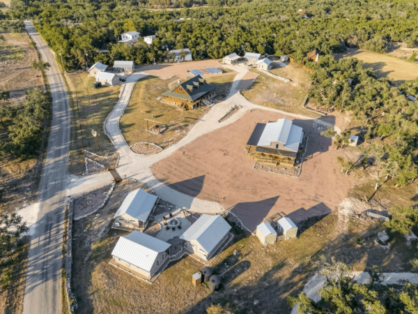 Texas Ranch With Log Home, Event Center & 9 Cottages