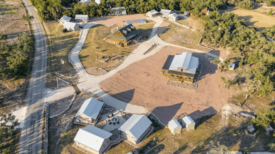 Texas Ranch With Log Home, Event Center & 9 Cottages