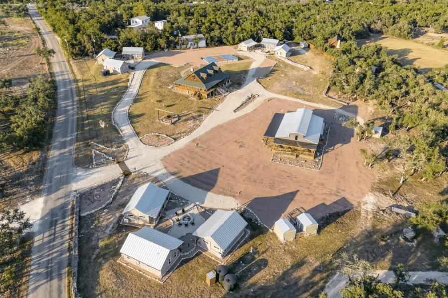 Texas Ranch With Log Home, Event Center & 9 Cottages
