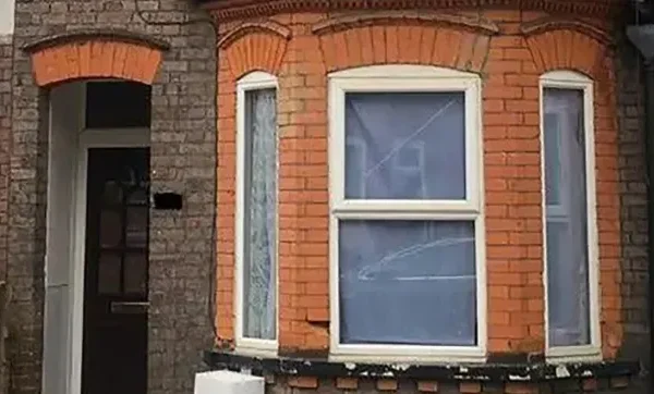Vicar whose house was ‘stolen’ gets possession back after four years