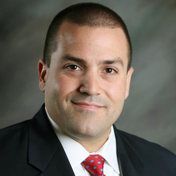Headshot of  Nathan Florio, principal with Deloitte & leader of the firm’s advisory and consulting real estate practice