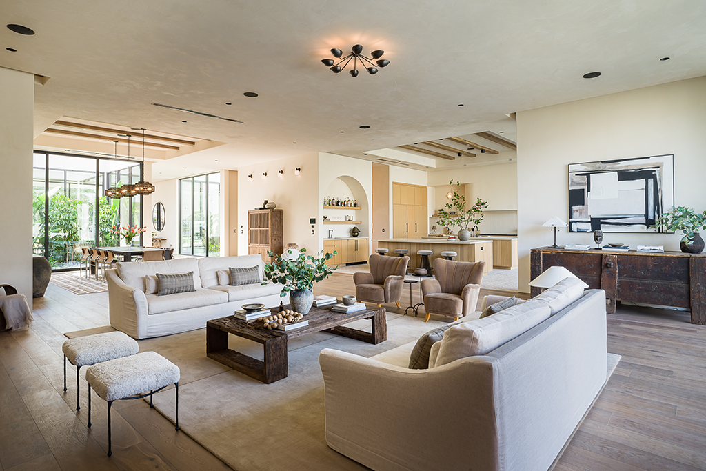 A view of all the living spaces, including kitchen, formal dining room and living room