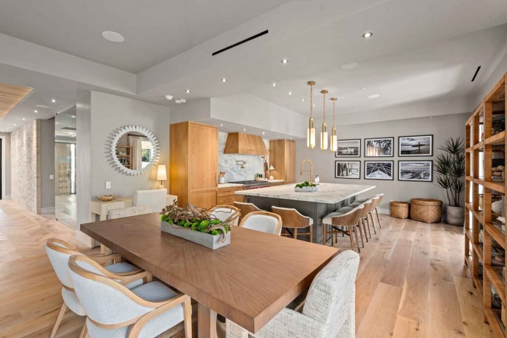 dining space with recessed lighting, vaulted ceiling, and light wood-style flooring