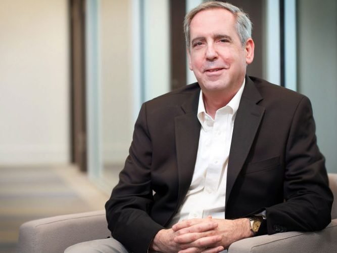 Headshot of Accesso CAO Paul Gaines