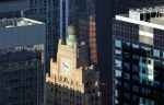 the iconic top of the landmarked art deco and beaux arts Paramount Building in Manhattan