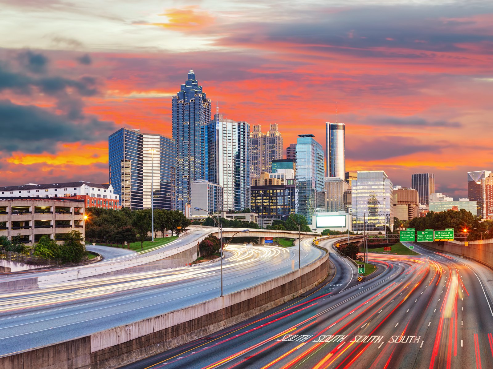 A photo of Atlanta's downtown area at the sunset.