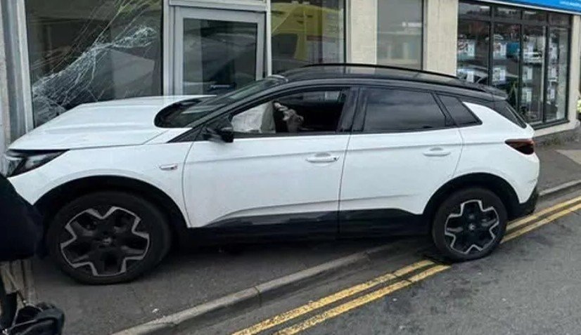 Car smashes into estate agents, leaving three injured