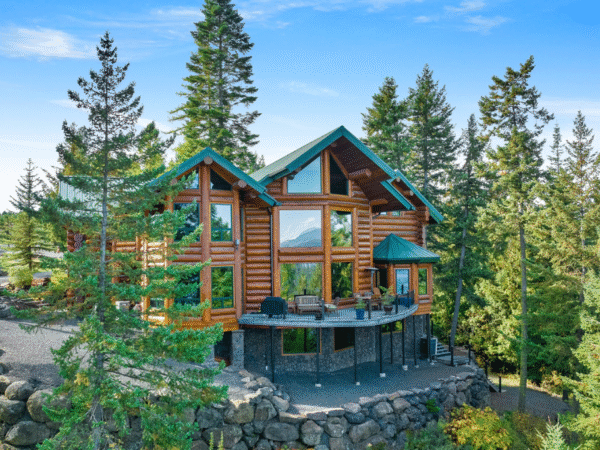 Panoramic Views Abound from This Majestic Log Home Overlooking Lake Coeur D’Alene 