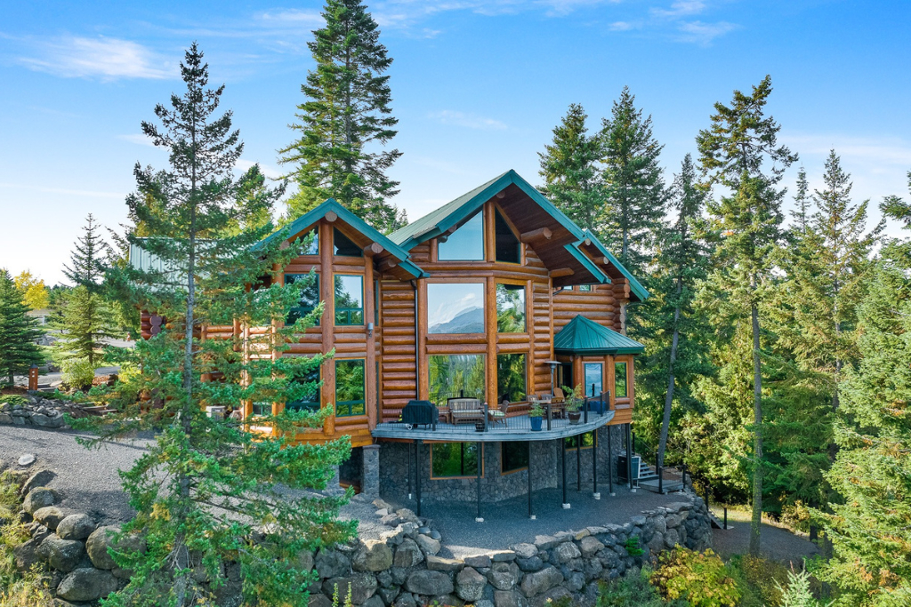 Panoramic Views Abound from This Majestic Log Home Overlooking Lake Coeur D’Alene 