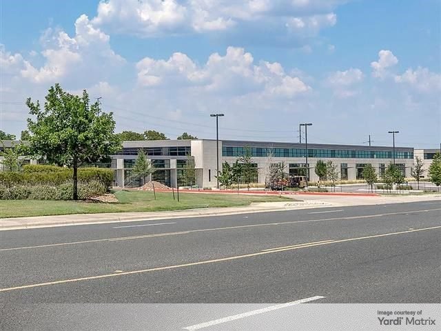 Exterior shot of the Creative Office at MetCenter,a four-building office campus in Austin, Texas.