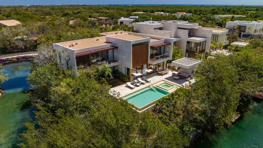Luxury Rosewood Mayakoba villa overlooking a tranquil lagoon with a private pool and sundeck