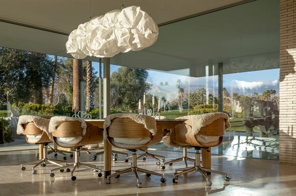 the iconic Kaufmann Desert House in Palm Springs, California, a masterpiece of desert modernism designed by architect Richard Neutra in 1946. The house is famously associated with the Slim Aarons photograph "Poolside Gossip" taken there in 1970.