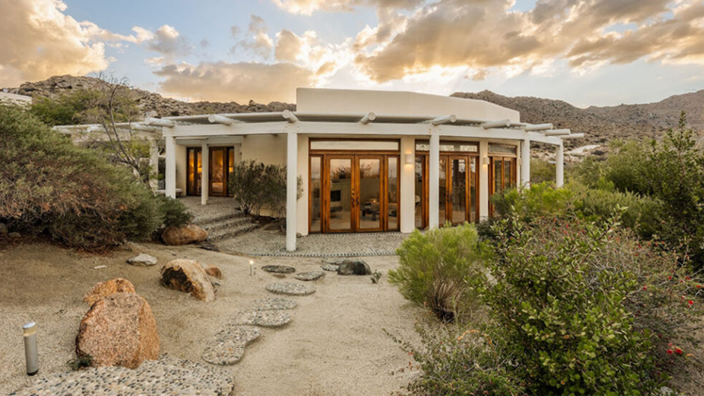 Mid-century modern Villa Palm Seco desert retreat with mountain views in Palm Desert, California.