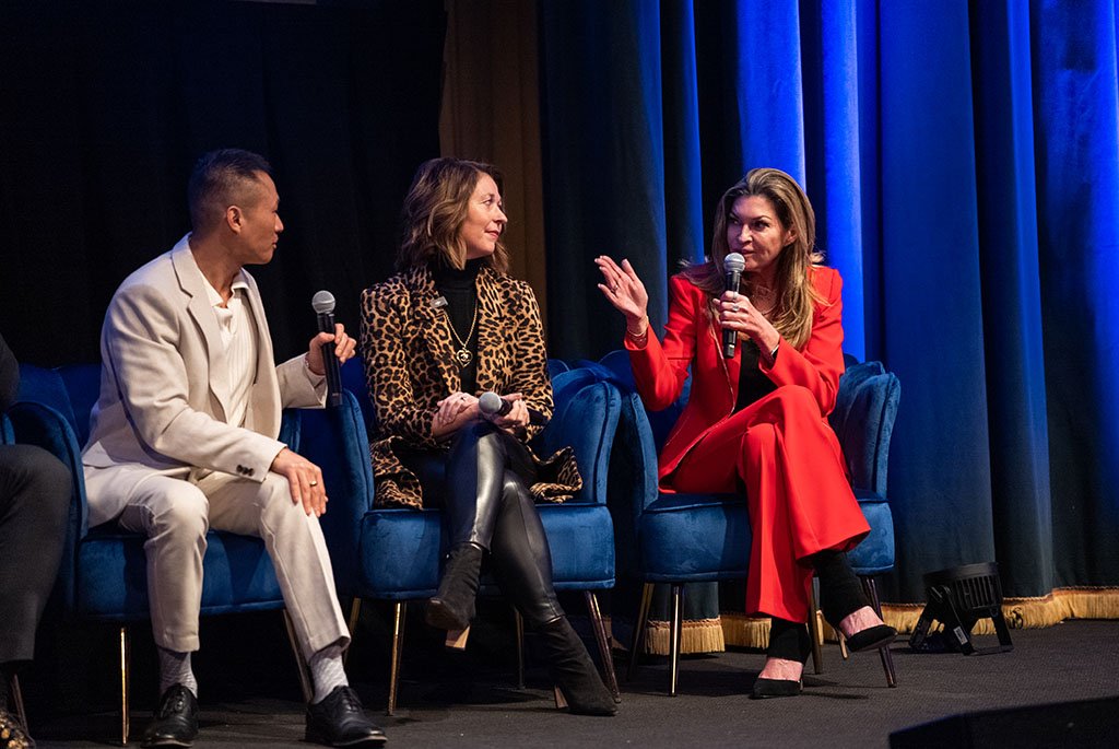 Real estate experts Juliet Clapp in a red suit, Wendy Forsythe in a leopard print jacket and James Wong at an Inman event.