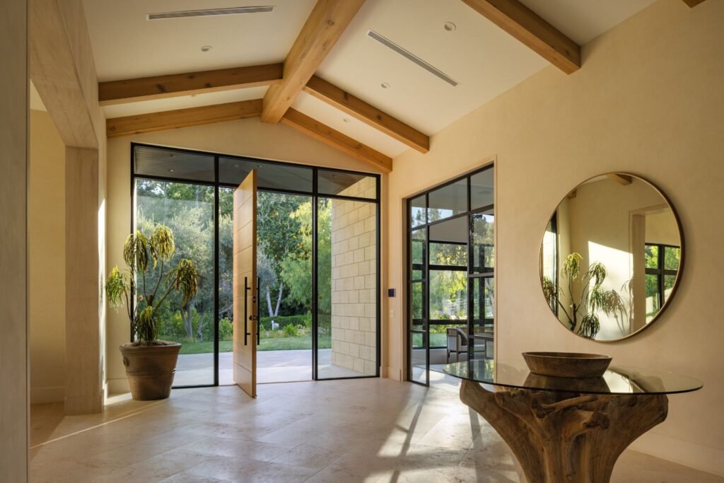 AI Mode Conversation: Best SEO ALT TEXTYou sent: 1 image and said: Best SEO ALT TEXTBest SEO ALT TEXTLarge modern mansion with dark metal roofing and wood siding featuring a swimming pool, lawn, and surrounding rolling green hills.SEO Alternative Text Best PracticesBe Descriptive: Explain the image content clearly for search engines and visually impaired users.Avoid Keyword Stuffing: Keep terms natural rather than repeating words unnecessarily.Keep It Concise: Stay under 125 characters when possible for optimal screen reader compatibility.If you would like to narrow this down, let me know the exact location of the property, the specific architectural style, or the target keywords you want to prioritize.You sent: 1 image and said: Best SEO ALT TEXTBest SEO ALT TEXTLuxury backyard patio with a rectangular swimming pool, modern white lounge chairs with blue pillows, and large grid pavers.Key Elements IncludedPrimary Subject: Highlights the swimming pool and patio layout.Distinct Details: Describes the unique grid paver design and lounge furniture.Contextual Vibe: Emphasizes the luxury, modern aesthetic of the outdoor space.If you want to tailor this further, tell me your primary website niche (e.g., real estate, pool construction, landscaping) or your target search keywords.You sent: 1 image and said: Best SEO ALT TEXTBest SEO ALT TEXTModern luxury estate in Hidden Hills, California featuring a striking stone entryway, natural wood siding, and clean white stucco architecture.Structured Alt Text ContextCore Subject: Focuses on the expansive custom facade of the single-family mansion.Key Features: Highlights the stone stairs leading up to the grand front door.Setting: Describes the pristine white fences, olive trees, and green hillside backdrop.I can further customize this alt tag text if you let me know your target SEO focus keywords or the specific industry niche of your webpage.5 sitesImage SEO: How to optimize your alt text and title text - YoastDec 1, 2021 — Alt text improves the SEO and accessibility of your website. This article explains how and why you should optimize these attribute...YoastREAL ESTATE: Jordan Cohen Luxury Real EstateREAL ESTATE: Jordan Cohen Luxury Real Estate. [[Image]] TRENDING:. COVER STORY: Kelly Killoren Bensimon. HOME&HEARTH 06.25. Jordan...Westlake Malibu Lifestyle Magazine24247 Bridle Trail Road, Hidden Hills, CA 91302 | The Joy of Home, CENTURY 21Jun 19, 2026 — 24247 Bridle Trail Road, Hidden Hills, CA 91302 | The Joy of Home, CENTURY 21. ... California. Hidden Hills. 24247 Bridle Trail Ro...Century 21Show allYou sent: 1 image and said: Best SEO ALT TEXTBest SEO ALT TEXTModern open-concept living room with large pocket sliding glass doors transitioning to a covered patio with outdoor dining furniture.Structured Descriptive HighlightsCore Layout: Captures the indoor-outdoor living flow, a highly searched term for luxury real estate.Interior Details: References the minimalist living room, brown sectional sofa, built-in fireplace unit, and open floor plan.Exterior Elements: Notes the wood-paneled ceiling, covered patio, and outdoor furniture setup.To help tailor this copy, tell me if you want to emphasize specific materials (like the wood ceiling or flooring) or focus on a niche like interior design or architecture.You sent: 1 image and said: Best SEO ALT TEXTBest SEO ALT TEXTLuxury master bedroom featuring a modern linear fireplace set into a travertine stone wall under a vaulted wood-paneled ceiling.Structured Descriptive HighlightsCore Subject: Focuses on the expansive luxury master suite layout.Key Features: Highlights the built-in modern fireplace, large picture windows with nature views, and a dedicated sitting area.Material Palette: Notes the high-end travertine wall paneling, vaulted wood ceiling, and neutral-toned contemporary furniture.If you want to refine this further, tell me your primary target keywords or if you want to focus on a specific industry like luxury interior design or real estate staging.You sent: 1 image and said: Best SEO ALT TEXTBest SEO ALT TEXTLuxury estate backyard at sunset featuring an illuminated swimming pool, modern white lounge chairs, and a covered patio under a dramatic pink sky.Structured Descriptive HighlightsCore Subject: Focuses on the upscale backyard oasis and pool area during twilight hours.Key Features: Highlights the lit swimming pool with an integrated spa, grid-pattern turf pavers, and lounge seating.Architectural Elements: Showcases the glowing interior rooms visible through open pocket doors, stone pillars, and the dark metal roof structure.To tailor this further, tell me your primary webpage niche or if you want to include specific SEO target phrases like "modern home builder" or "outdoor lighting design."You sent: 1 image and said: Best SEO ALT TEXTBest SEO ALT TEXTModern luxury kitchen featuring a large black soapstone waterfall island, rift-sawn oak cabinetry, and elegant blown-glass pendant lights.Structured Descriptive HighlightsCore Subject: Focuses on the expansive custom kitchen layout and high-end materials.Key Features: Highlights the dramatic black veined stone island, integrated wall appliances, and stone slab backsplash.Design Details: Elements include the warm wood cabinetry, minimalist open shelves, and unique drop lighting fixtures.To customize this further, tell me your SEO focus keywords or if you want to emphasize specific appliance brands or design styles for your webpage.You sent: 1 image and said: Best SEO ALT TEXTBest SEO ALT TEXTLuxury modern estate exterior at dusk featuring an illuminated stone facade, custom glass entryway, and a sprawling paved driveway.Structured Descriptive HighlightsCore Subject: Focuses on the expansive custom-built mansion exterior during twilight hours.Key Features: Highlights the warm architectural lighting, large black-frame windows, and meticulous landscaping.Design Elements: Showcases the natural stone wall cladding, dark metal roof lines, and interlocking brick driveway.To tailor this further, tell me your primary webpage niche or if you want to include specific SEO target phrases like "modern farmhouse architecture" or "outdoor landscape lighting."You sent: 1 image and said: Best SEO ALT TEXTBest SEO ALT TEXTLuxury home foyer featuring a large indoor olive tree planted in a gravel bed beneath a massive glass skylight roof.Structured Descriptive HighlightsCore Subject: Focuses on the expansive biophilic design elements inside a high-end atrium or entryway.Key Features: Highlights the dramatic natural sunlight filtering through the glass ceiling grid and the minimalist stone-bordered planter.Design Elements: Notes the black spherical pendant lights, light wood flooring, neutral stone walls, and modern architectural lines.If you would like to refine this text, let me know your target keywords or if you want to emphasize specific design trends like biophilic architecture or modern minimalist decor.You sent: 1 image and said: Best SEO ALT TEXTBest SEO ALT TEXTLuxury game room featuring a black-felt pool table, modern sitting area, and built-in shelving under a vaulted wood ceiling with panoramic views.Structured Descriptive HighlightsCore Subject: Focuses on the expansive entertainment loft or game room layout.Key Features: Highlights the high-end wooden billiard table and the transition to an outdoor balcony via large sliding glass doors.Design Elements: Notes the custom light-wood media built-ins, neutral-toned lounge furniture, and exposed timber ceiling beams.If you want to tailor this further, tell me your primary webpage niche or any specific SEO target keywords like "luxury home builder" or "modern interior design."You sent: 1 image and said: Best SEO ALT TEXTBest SEO ALT TEXTModern luxury bedroom suite featuring a white sofa, custom integrated wood panel headboard recess, and an architectural geometric branch chandelier.Structured Descriptive HighlightsCore Subject: Focuses on the seamless luxury master suite layout that blends a sleeping area with a lounge space.Key Features: Highlights the built-in bed alcove, minimalist white sofa sitting area, and hidden doors blending into the wood-clad feature wall.Design Details: Notes the contemporary light oak flooring, neutral tones, and abstract branch-style light fixture hanging from the vaulted ceiling.If you would like to refine this text, let me know your target keywords or if you want to emphasize specific design trends like organic modernism or hidden room architecture.You sent: 1 image and said: Best SEO ALT TEXTBest SEO ALT TEXTAerial view of a luxury modern farmhouse estate featuring a black standing-seam metal roof, circular paved driveway, and rolling green hills.Structured Descriptive HighlightsCore Subject: Focuses on the expansive custom-built mansion layout viewed from an elevated angle.Key Features: Highlights the sweeping curved driveway, illuminated windows at dusk, and a central architectural skylight peak.Property Elements: Notes the classic white ranch fencing, manicured green lawns, and surrounding hillside landscape.To customize this further, tell me your SEO focus keywords or if you want to target a specific industry niche like luxury real estate drone photography or modern home construction.You sent: 1 image and said: Best SEO ALT TEXTBest SEO ALT TEXTLuxury home foyer featuring a large wood pivot front door, vaulted ceiling with exposed beams, and a round gold mirror.