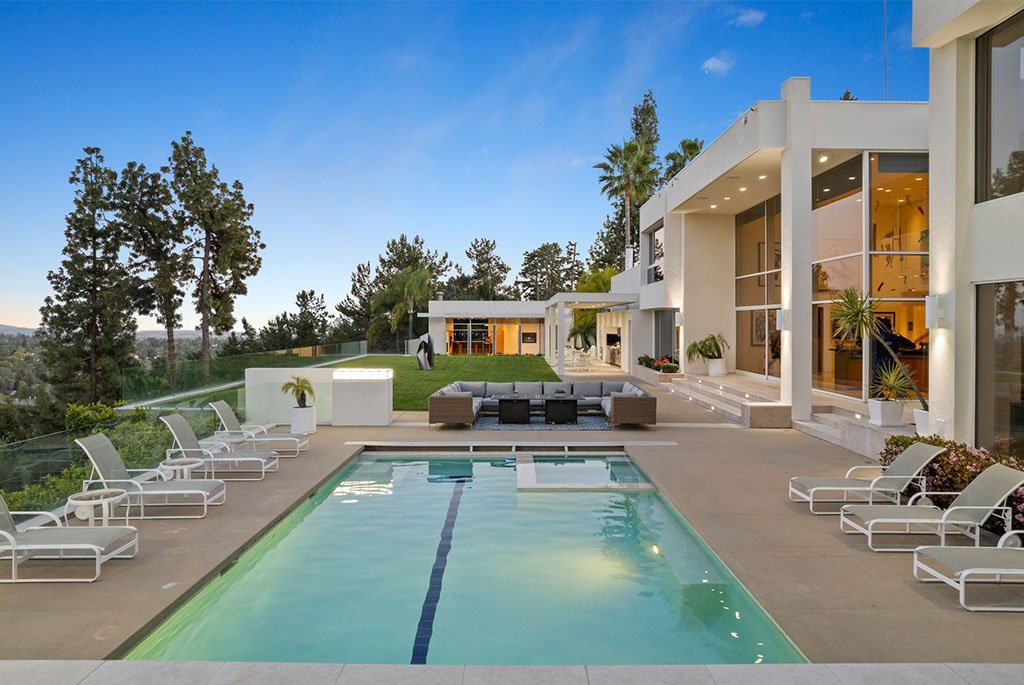 Luxury lap pool and outdoor lounge patio at 300 N San Rafael Avenue in Pasadena California.