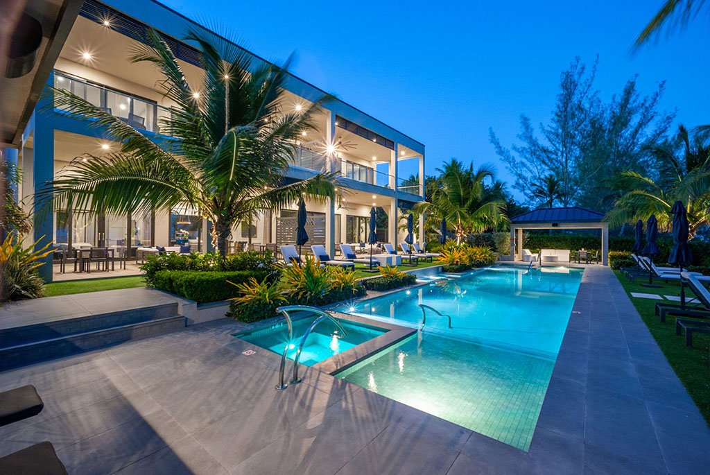 Modern luxury beachfront estate and swimming pool at Black Urchin Boutique Resort in Grand Cayman.