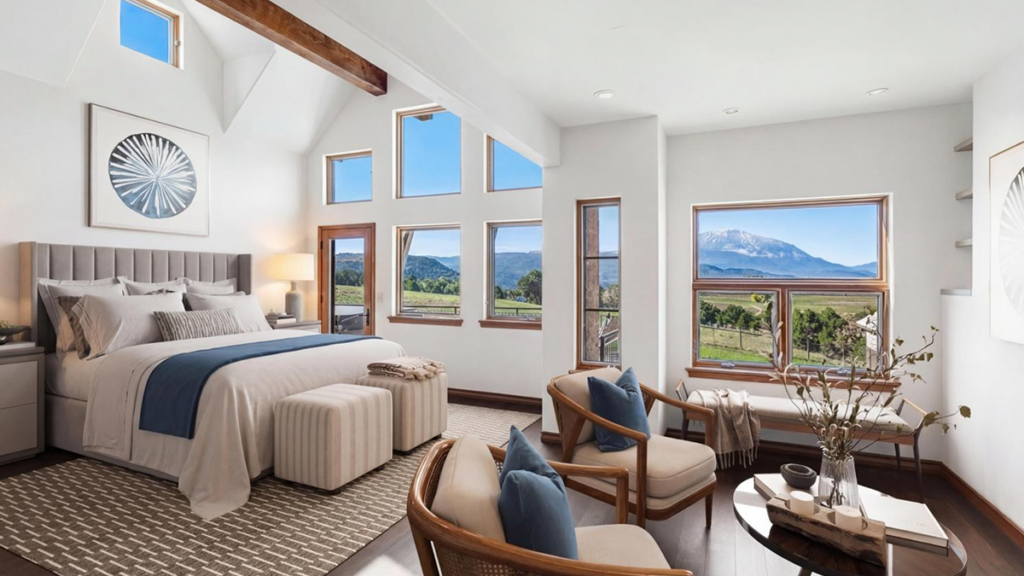 Luxury primary bedroom with vaulted ceilings and mountain views at Paradise Ridge in Carbondale Colorado.