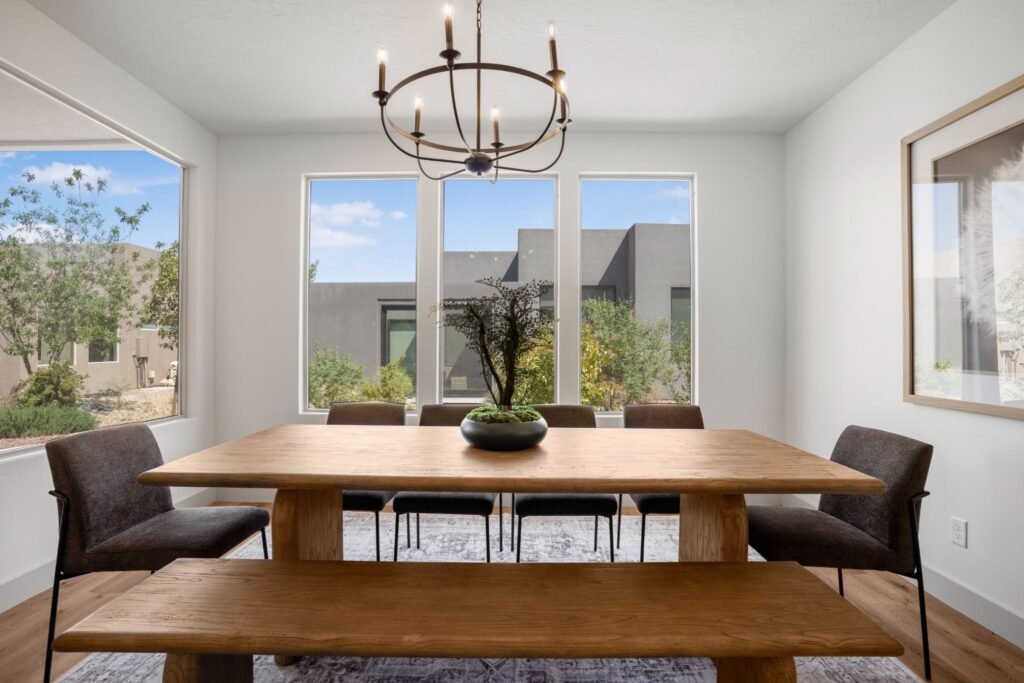 Bright luxury real estate interior at Tava Resort in St. George, Utah, showcasing an open-concept dining space with abundant natural light.