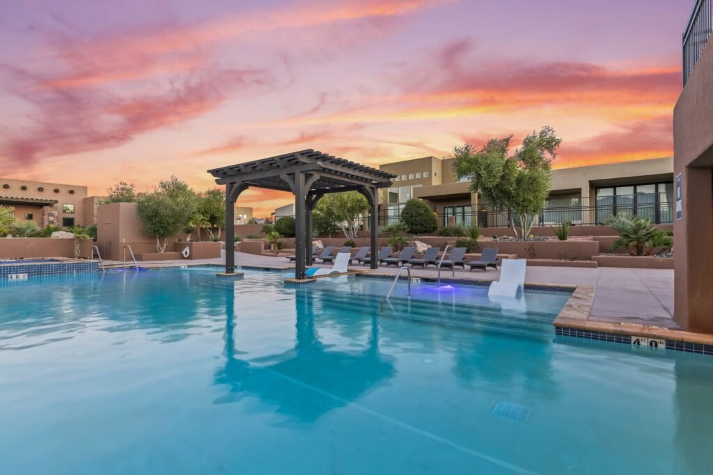 Tava Resort vacation home community in Southern Utah showcasing premium pool amenities, meticulous landscaping, and desert-style luxury architecture.