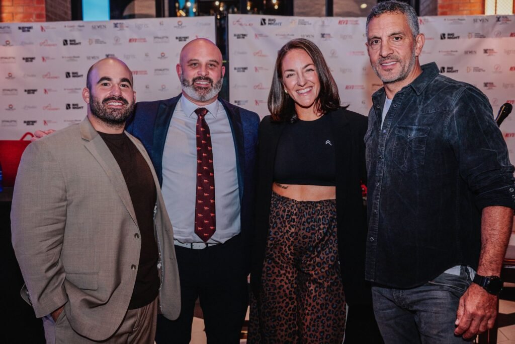 The Agency Founder and CEO Mauricio Umansky posing with Managing Partner Jeremy Stivaletta, Meaghan St. Marc, and Jamie Pollock at the Boston business networking event.